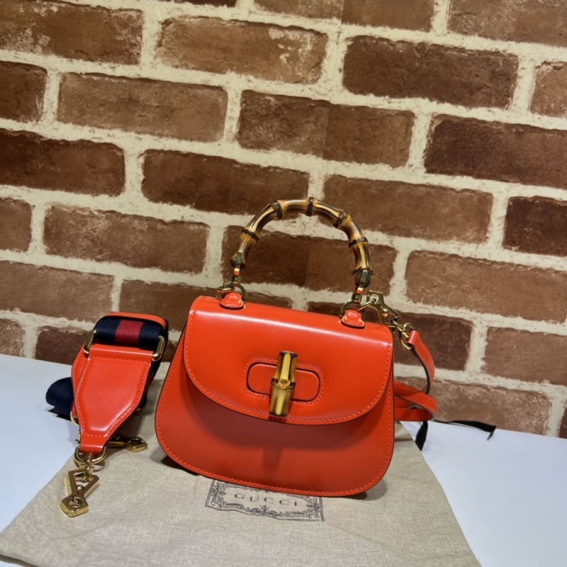 G*u*i top handle bags